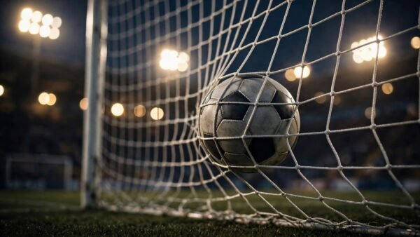 Fußball im Tornetz bei Flutlicht